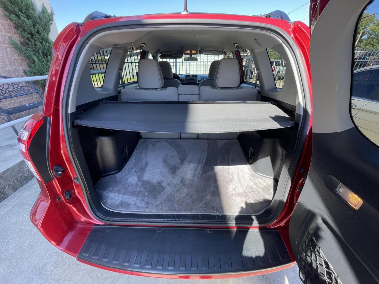 2011 Red /Silver Toyota RAV4 Base I4 2WD (2T3ZF4DV2BW) with an 2.4L L4 DOHC 16V engine, 4-Speed Automatic transmission, located at 1501 West 15th St., Houston, 77008, (713) 869-2925, 29.797941, -95.411789 - Photo#13