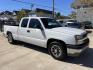 2004 White /Black Chevrolet Silverado 1500 Ext. Cab Long Bed 2WD (1GCEC19X74Z) with an 4.3L V6 OHV 12V engine, 4-Speed Automatic Overdrive transmission, located at 1501 West 15th St., Houston, 77008, (713) 869-2925, 29.797941, -95.411789 - Photo#1