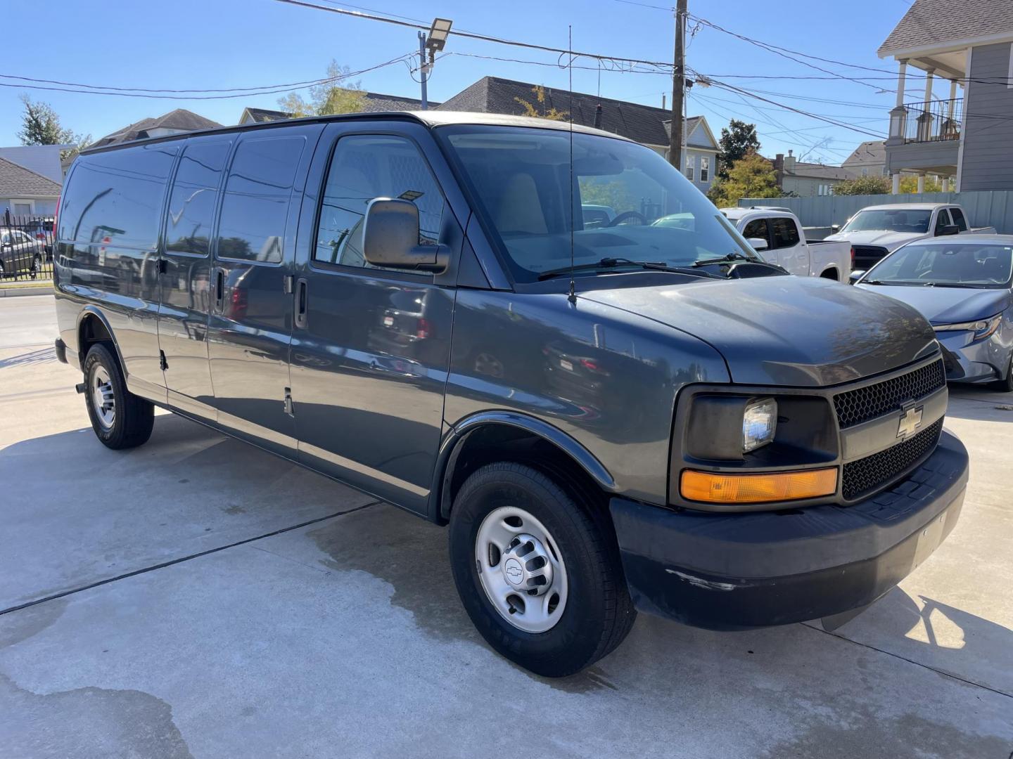 2014 Gray /Silver Chevrolet Express 3500 Cargo Extended (1GCZGUFG0E1) with an 6.0L V8 OHV 16V FFV engine, 6-Speed Automatic transmission, located at 1501 West 15th St., Houston, 77008, (713) 869-2925, 29.797941, -95.411789 - Photo#1
