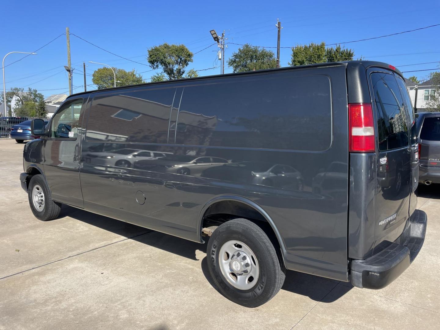 2014 Gray /Silver Chevrolet Express 3500 Cargo Extended (1GCZGUFG0E1) with an 6.0L V8 OHV 16V FFV engine, 6-Speed Automatic transmission, located at 1501 West 15th St., Houston, 77008, (713) 869-2925, 29.797941, -95.411789 - Photo#3