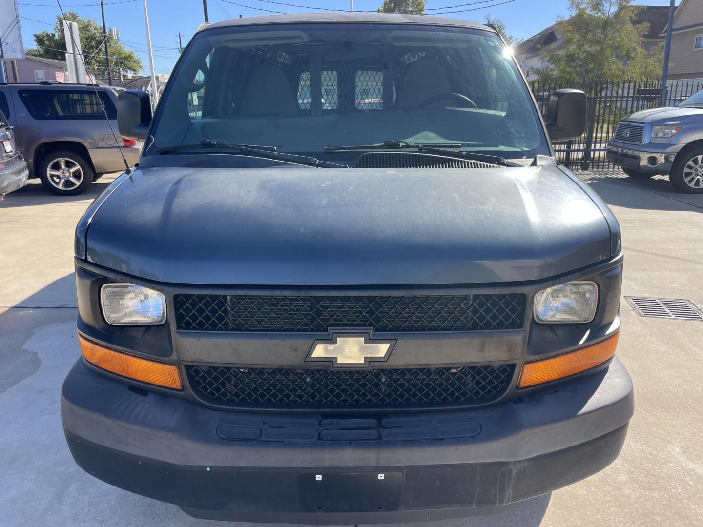 2014 Gray /Silver Chevrolet Express 3500 Cargo Extended (1GCZGUFG0E1) with an 6.0L V8 OHV 16V FFV engine, 6-Speed Automatic transmission, located at 1501 West 15th St., Houston, 77008, (713) 869-2925, 29.797941, -95.411789 - Photo#4