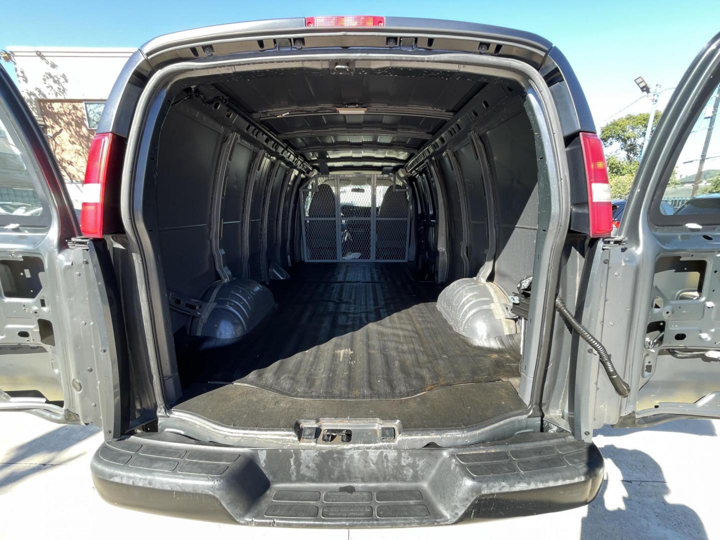 2014 Gray /Silver Chevrolet Express 3500 Cargo Extended (1GCZGUFG0E1) with an 6.0L V8 OHV 16V FFV engine, 6-Speed Automatic transmission, located at 1501 West 15th St., Houston, 77008, (713) 869-2925, 29.797941, -95.411789 - Photo#9