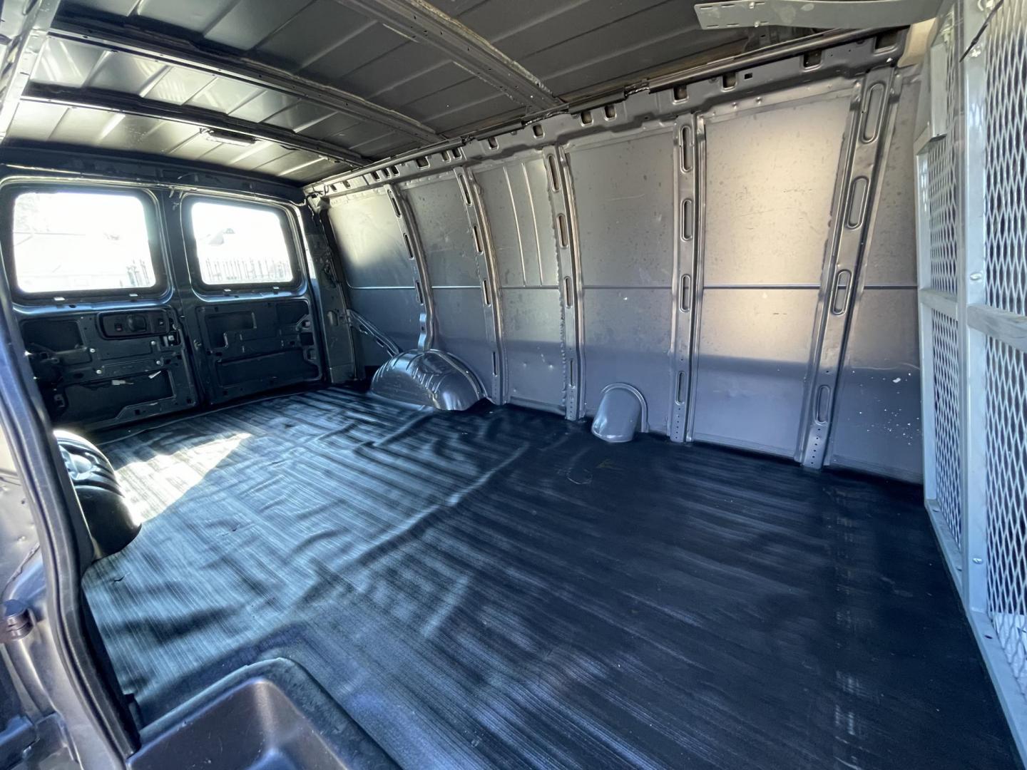 2014 Gray /Silver Chevrolet Express 3500 Cargo Extended (1GCZGUFG0E1) with an 6.0L V8 OHV 16V FFV engine, 6-Speed Automatic transmission, located at 1501 West 15th St., Houston, 77008, (713) 869-2925, 29.797941, -95.411789 - Photo#11