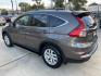 2015 Brown /Black Honda CR-V EX-L 4WD (2HKRM4H72FH) with an 2.4L L4 DOHC 16V engine, Continuously Variable Transmission transmission, located at 1501 West 15th St., Houston, 77008, (713) 869-2925, 29.797941, -95.411789 - Photo#3