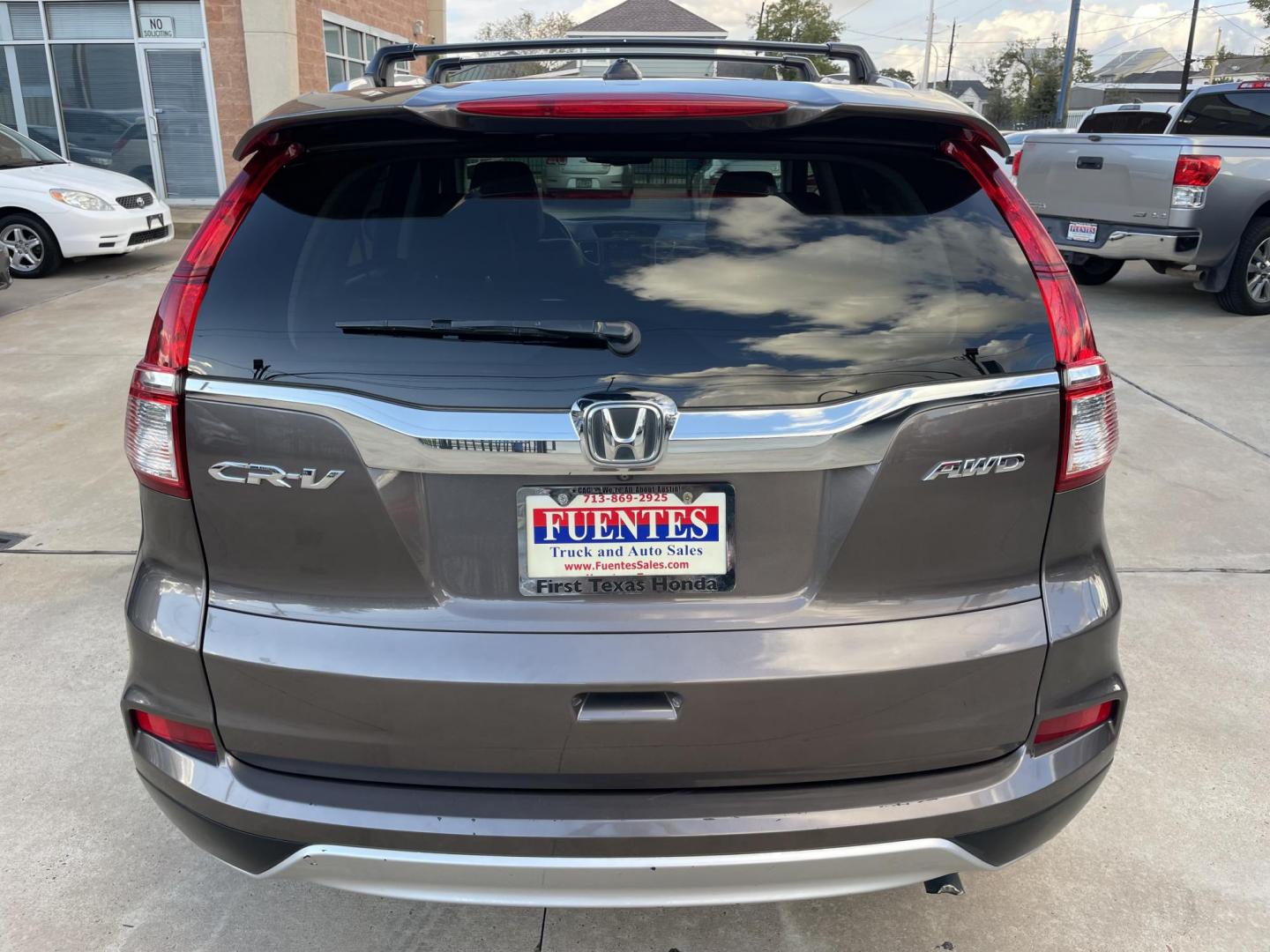 2015 Brown /Black Honda CR-V EX-L 4WD (2HKRM4H72FH) with an 2.4L L4 DOHC 16V engine, Continuously Variable Transmission transmission, located at 1501 West 15th St., Houston, 77008, (713) 869-2925, 29.797941, -95.411789 - Photo#5