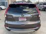 2015 Brown /Black Honda CR-V EX-L 4WD (2HKRM4H72FH) with an 2.4L L4 DOHC 16V engine, Continuously Variable Transmission transmission, located at 1501 West 15th St., Houston, 77008, (713) 869-2925, 29.797941, -95.411789 - Photo#5