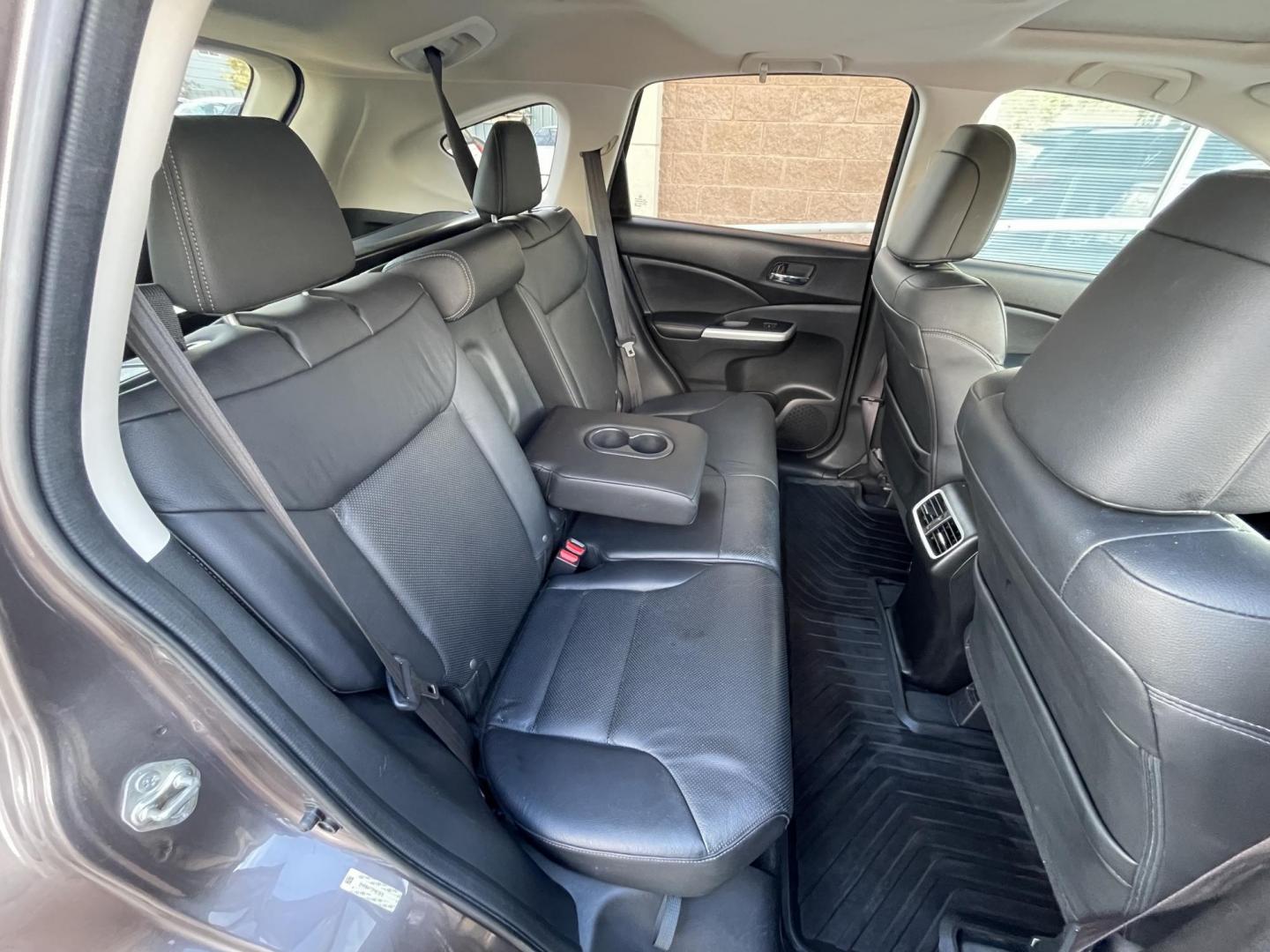 2015 Brown /Black Honda CR-V EX-L 4WD (2HKRM4H72FH) with an 2.4L L4 DOHC 16V engine, Continuously Variable Transmission transmission, located at 1501 West 15th St., Houston, 77008, (713) 869-2925, 29.797941, -95.411789 - Photo#12