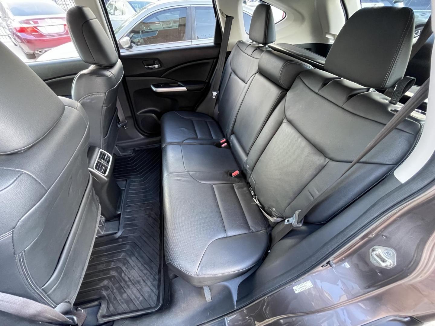 2015 Brown /Black Honda CR-V EX-L 4WD (2HKRM4H72FH) with an 2.4L L4 DOHC 16V engine, Continuously Variable Transmission transmission, located at 1501 West 15th St., Houston, 77008, (713) 869-2925, 29.797941, -95.411789 - Photo#11