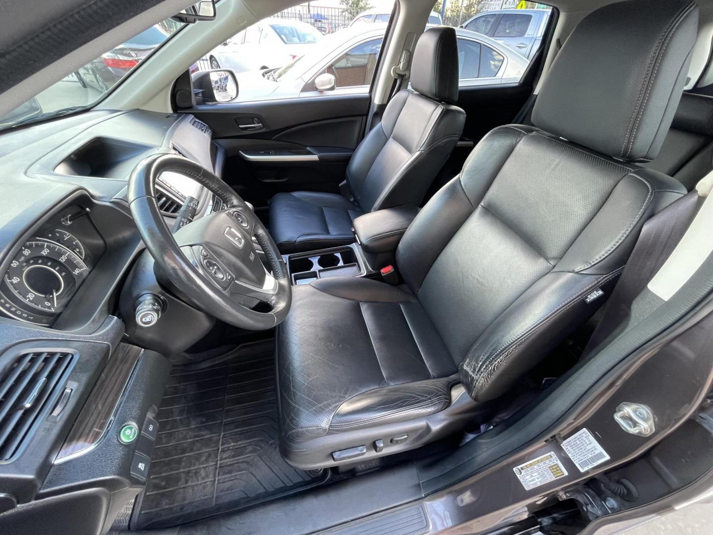 2015 Brown /Black Honda CR-V EX-L 4WD (2HKRM4H72FH) with an 2.4L L4 DOHC 16V engine, Continuously Variable Transmission transmission, located at 1501 West 15th St., Houston, 77008, (713) 869-2925, 29.797941, -95.411789 - Photo#10