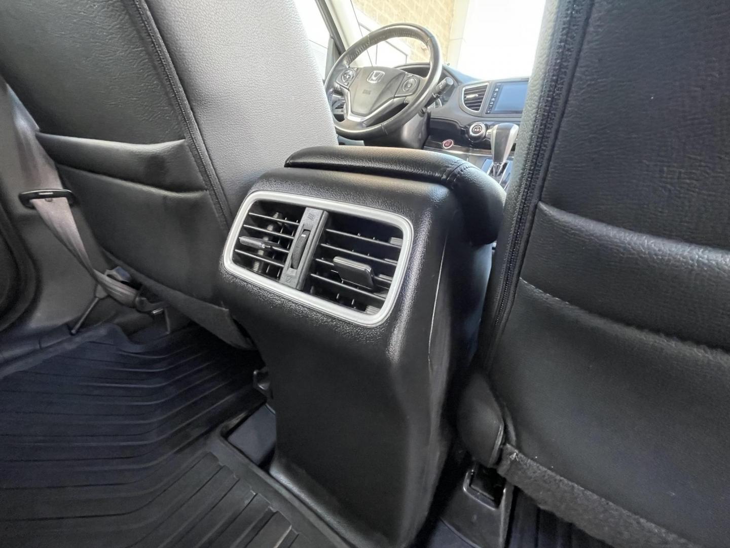 2015 Brown /Black Honda CR-V EX-L 4WD (2HKRM4H72FH) with an 2.4L L4 DOHC 16V engine, Continuously Variable Transmission transmission, located at 1501 West 15th St., Houston, 77008, (713) 869-2925, 29.797941, -95.411789 - Photo#14