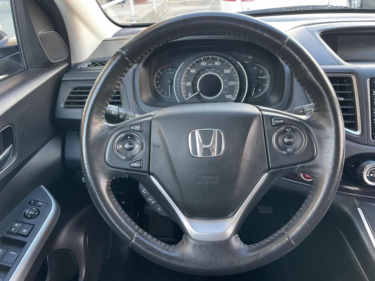 2015 Brown /Black Honda CR-V EX-L 4WD (2HKRM4H72FH) with an 2.4L L4 DOHC 16V engine, Continuously Variable Transmission transmission, located at 1501 West 15th St., Houston, 77008, (713) 869-2925, 29.797941, -95.411789 - Photo#19