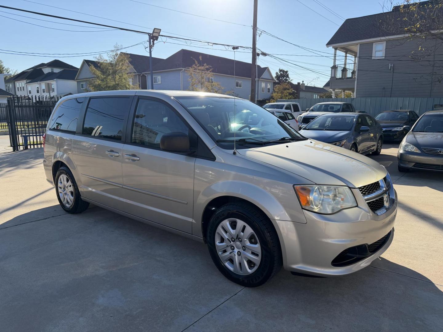 2014 Beige /Beige Dodge Grand Caravan SE (2C4RDGBG1ER) with an 3.6L V6 DOHC 24V engine, 6-Speed Automatic transmission, located at 1501 West 15th St., Houston, 77008, (713) 869-2925, 29.797941, -95.411789 - Photo#1