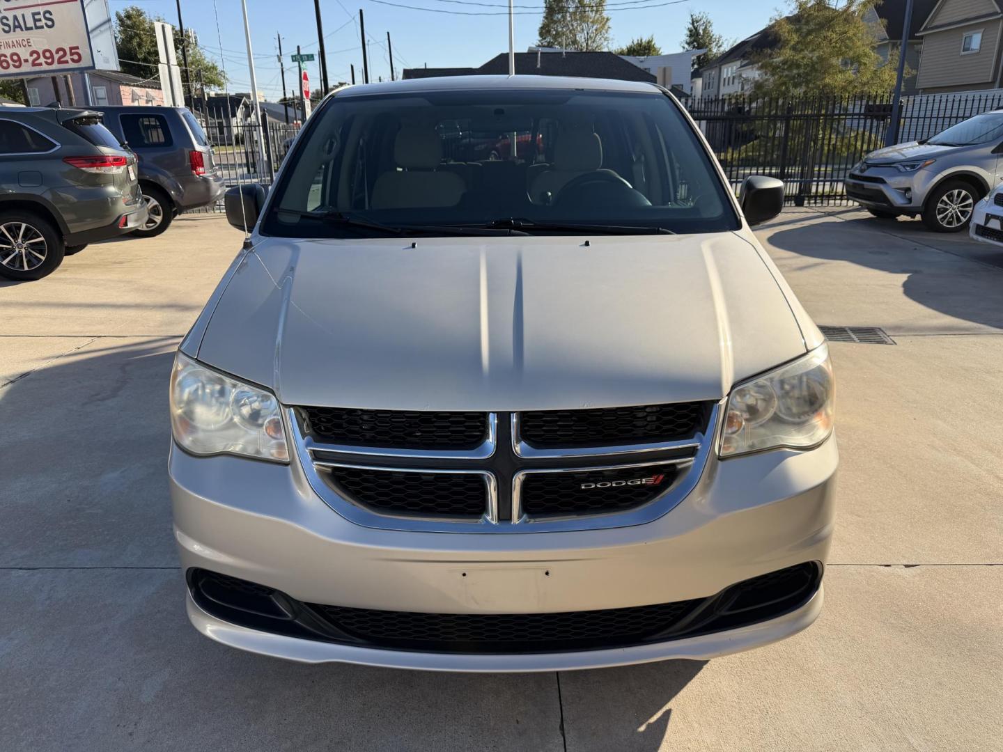 2014 Beige /Beige Dodge Grand Caravan SE (2C4RDGBG1ER) with an 3.6L V6 DOHC 24V engine, 6-Speed Automatic transmission, located at 1501 West 15th St., Houston, 77008, (713) 869-2925, 29.797941, -95.411789 - Photo#5