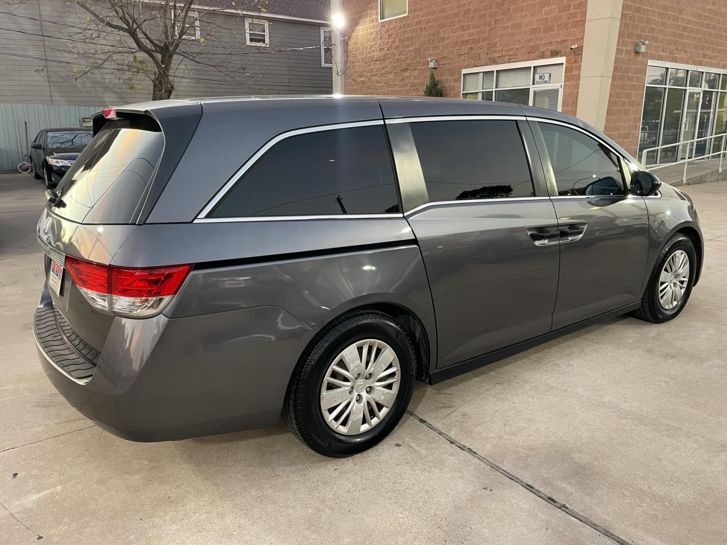 2016 Gray /Silver Honda Odyssey LX (5FNRL5H23GB) with an 3.5L V6 SOHC 24V engine, 6A transmission, located at 1501 West 15th St., Houston, 77008, (713) 869-2925, 29.797941, -95.411789 - Photo#2