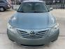 2009 Green /Beige Toyota Camry CE 5-Spd AT (4T4BE46K99R) with an 2.4L L4 DOHC 16V engine, 5-Speed Automatic Overdrive transmission, located at 1501 West 15th St., Houston, 77008, (713) 869-2925, 29.797941, -95.411789 - Photo#4
