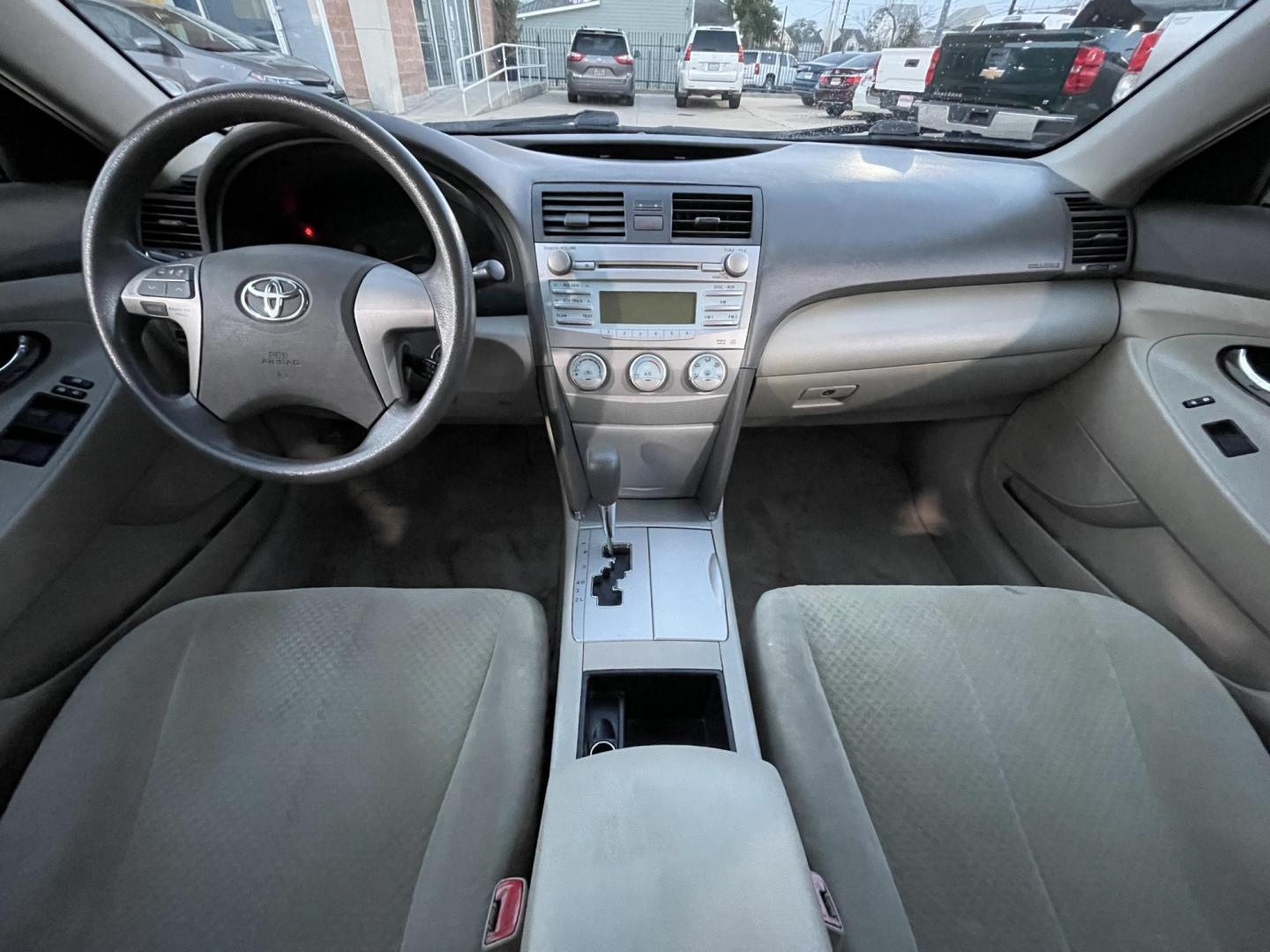2009 Green /Beige Toyota Camry CE 5-Spd AT (4T4BE46K99R) with an 2.4L L4 DOHC 16V engine, 5-Speed Automatic Overdrive transmission, located at 1501 West 15th St., Houston, 77008, (713) 869-2925, 29.797941, -95.411789 - Photo#10