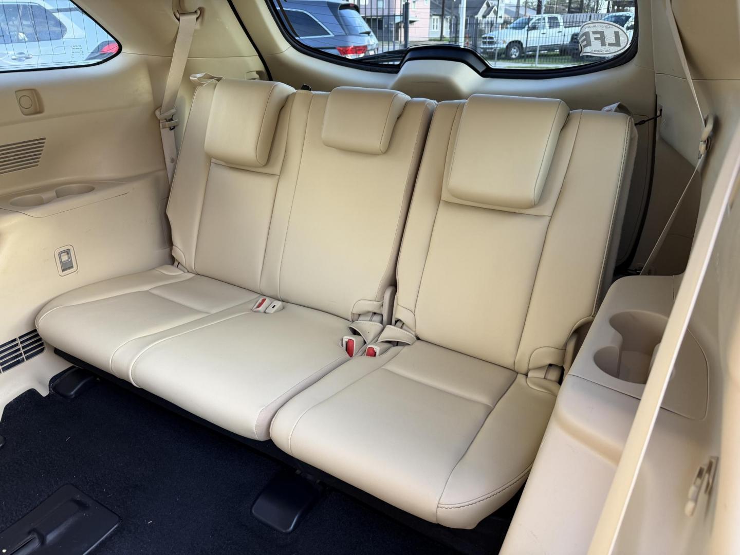 2019 Maroon /Tan Toyota Highlander XLE AWD V6 (5TDJZRFHXKS) with an 3.5L V6 DOHC 24V engine, 6A transmission, located at 1501 West 15th St., Houston, 77008, (713) 869-2925, 29.797941, -95.411789 - Photo#7