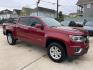 2017 Red /Gray Chevrolet Colorado LT Crew Cab 2WD Short Box (1GCGSCEA1H1) with an 2.5L L4 DOHC 16V GAS engine, 6A transmission, located at 1501 West 15th St., Houston, 77008, (713) 869-2925, 29.797941, -95.411789 - Photo#1