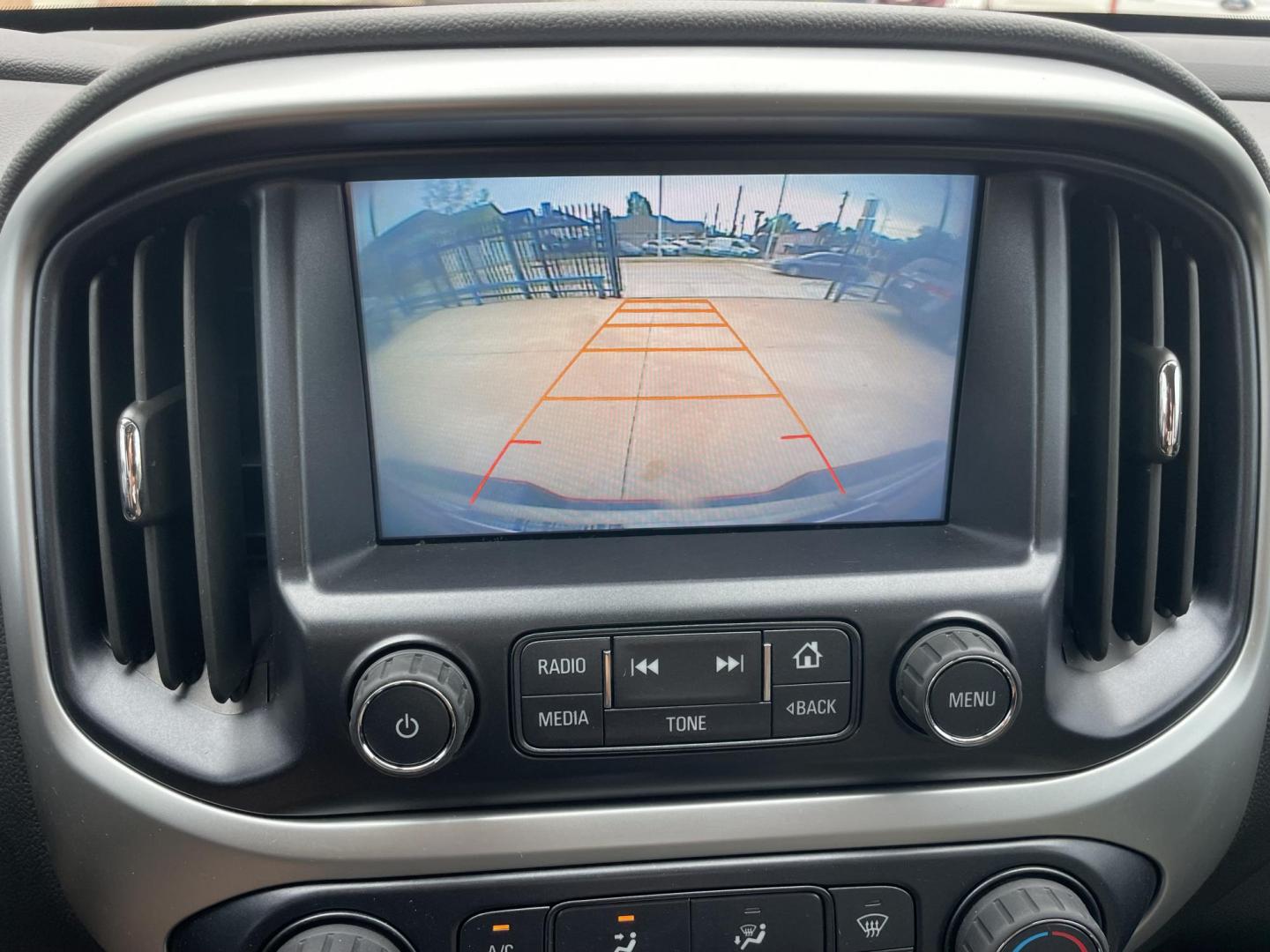 2017 Red /Gray Chevrolet Colorado LT Crew Cab 2WD Short Box (1GCGSCEA1H1) with an 2.5L L4 DOHC 16V GAS engine, 6A transmission, located at 1501 West 15th St., Houston, 77008, (713) 869-2925, 29.797941, -95.411789 - Photo#14