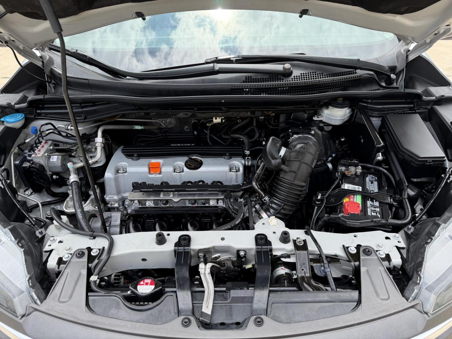 2012 Silver /Silver Honda CR-V EX 2WD 5-Speed AT (2HKRM3H59CH) with an 2.4L L4 DOHC 16V engine, 5-Speed Automatic transmission, located at 1501 West 15th St., Houston, 77008, (713) 869-2925, 29.797941, -95.411789 - Photo#11