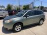 2014 Green /Silver Subaru Forester 2.5i Premium (JF2SJADC7EH) with an 2.5L H4 SOHC 16V engine, 6-Speed Automatic transmission, located at 1501 West 15th St., Houston, 77008, (713) 869-2925, 29.797941, -95.411789 - Photo#0