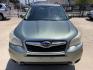 2014 Green /Silver Subaru Forester 2.5i Premium (JF2SJADC7EH) with an 2.5L H4 SOHC 16V engine, 6-Speed Automatic transmission, located at 1501 West 15th St., Houston, 77008, (713) 869-2925, 29.797941, -95.411789 - Photo#4