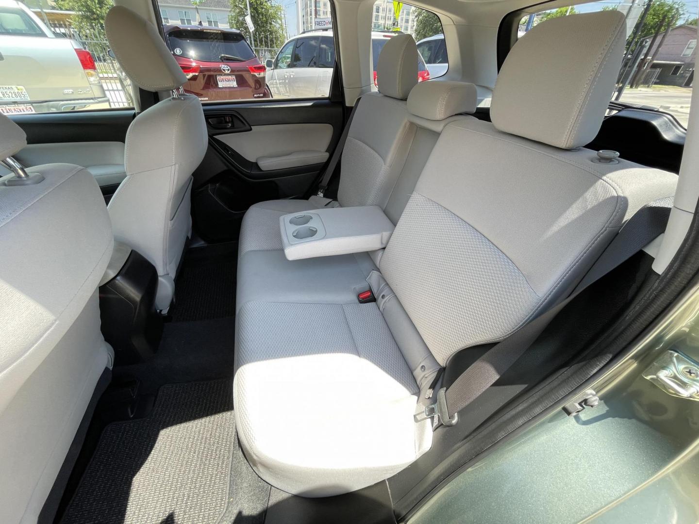 2014 Green /Silver Subaru Forester 2.5i Premium (JF2SJADC7EH) with an 2.5L H4 SOHC 16V engine, 6-Speed Automatic transmission, located at 1501 West 15th St., Houston, 77008, (713) 869-2925, 29.797941, -95.411789 - Photo#7
