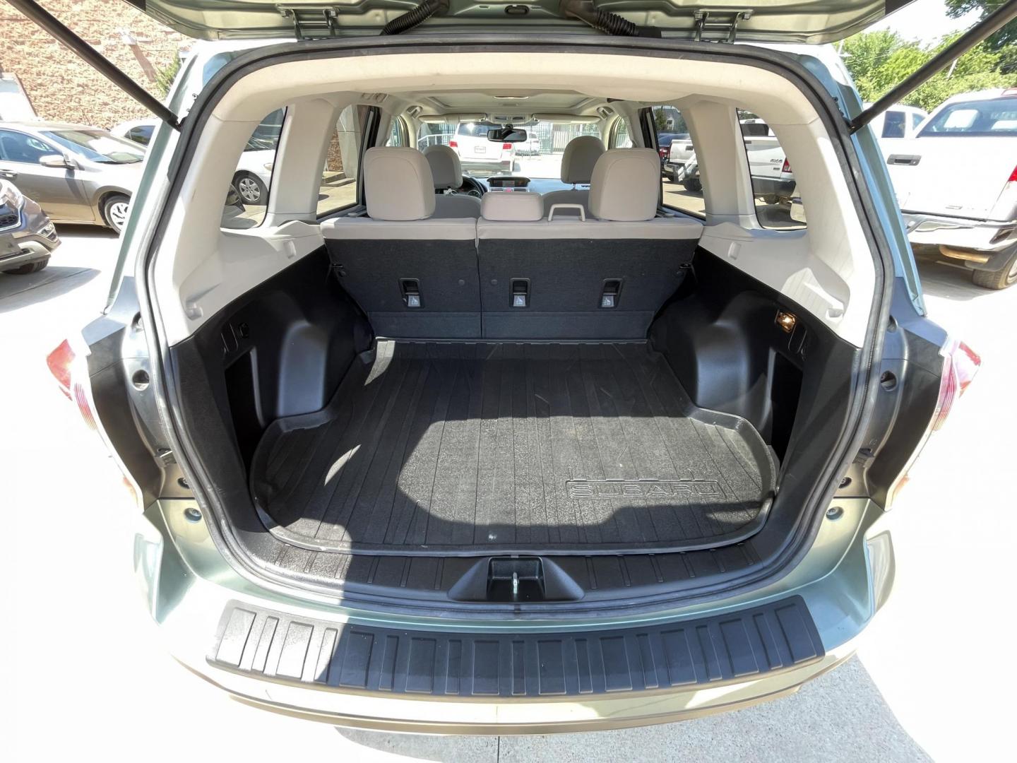 2014 Green /Silver Subaru Forester 2.5i Premium (JF2SJADC7EH) with an 2.5L H4 SOHC 16V engine, 6-Speed Automatic transmission, located at 1501 West 15th St., Houston, 77008, (713) 869-2925, 29.797941, -95.411789 - Photo#9