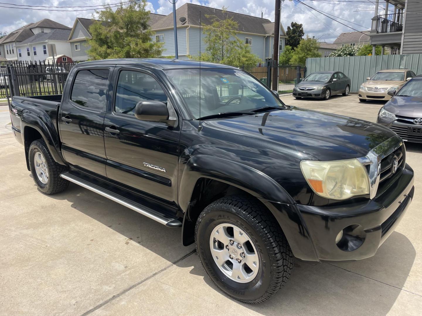 2006 Black /Silver Toyota Tacoma PreRunner Double Cab V6 Auto 2WD (5TEJU62N46Z) with an 4.0L V6 DOHC 24V engine, 5-Speed Automatic Overdrive transmission, located at 1501 West 15th St., Houston, 77008, (713) 869-2925, 29.797941, -95.411789 - Photo#1