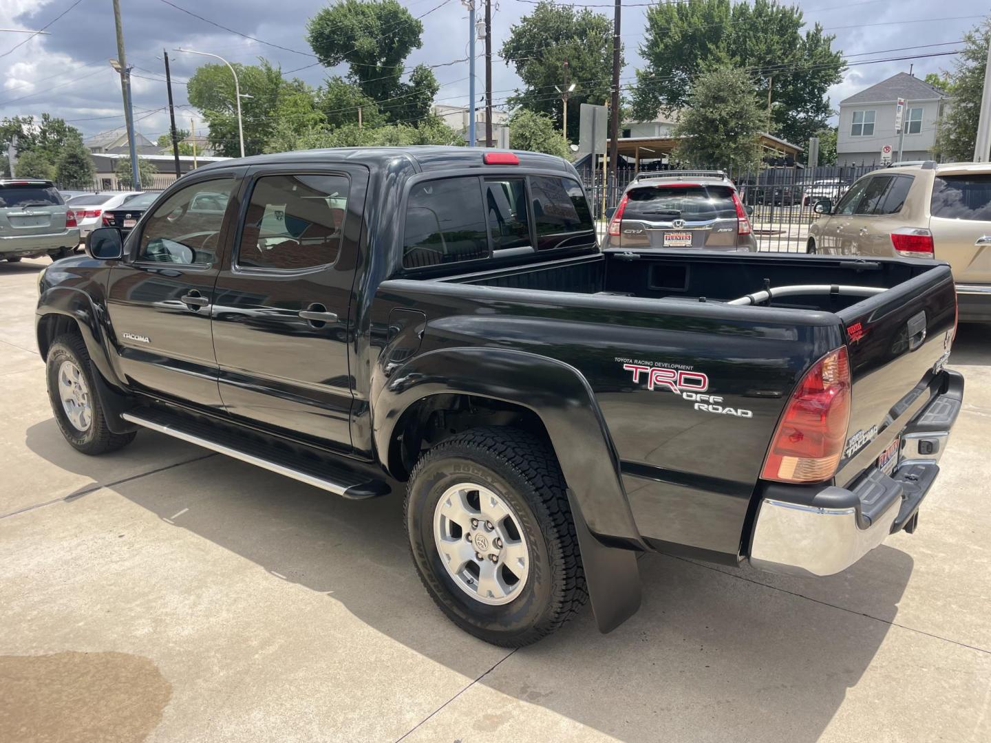 2006 Black /Silver Toyota Tacoma PreRunner Double Cab V6 Auto 2WD (5TEJU62N46Z) with an 4.0L V6 DOHC 24V engine, 5-Speed Automatic Overdrive transmission, located at 1501 West 15th St., Houston, 77008, (713) 869-2925, 29.797941, -95.411789 - Photo#3