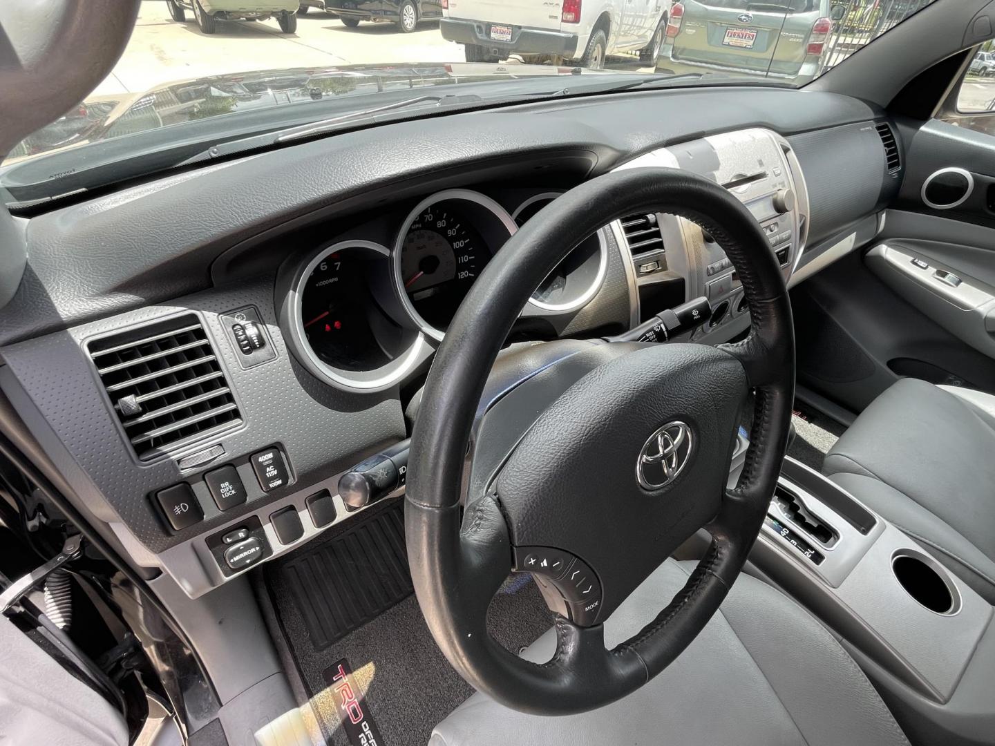 2006 Black /Silver Toyota Tacoma PreRunner Double Cab V6 Auto 2WD (5TEJU62N46Z) with an 4.0L V6 DOHC 24V engine, 5-Speed Automatic Overdrive transmission, located at 1501 West 15th St., Houston, 77008, (713) 869-2925, 29.797941, -95.411789 - Photo#11
