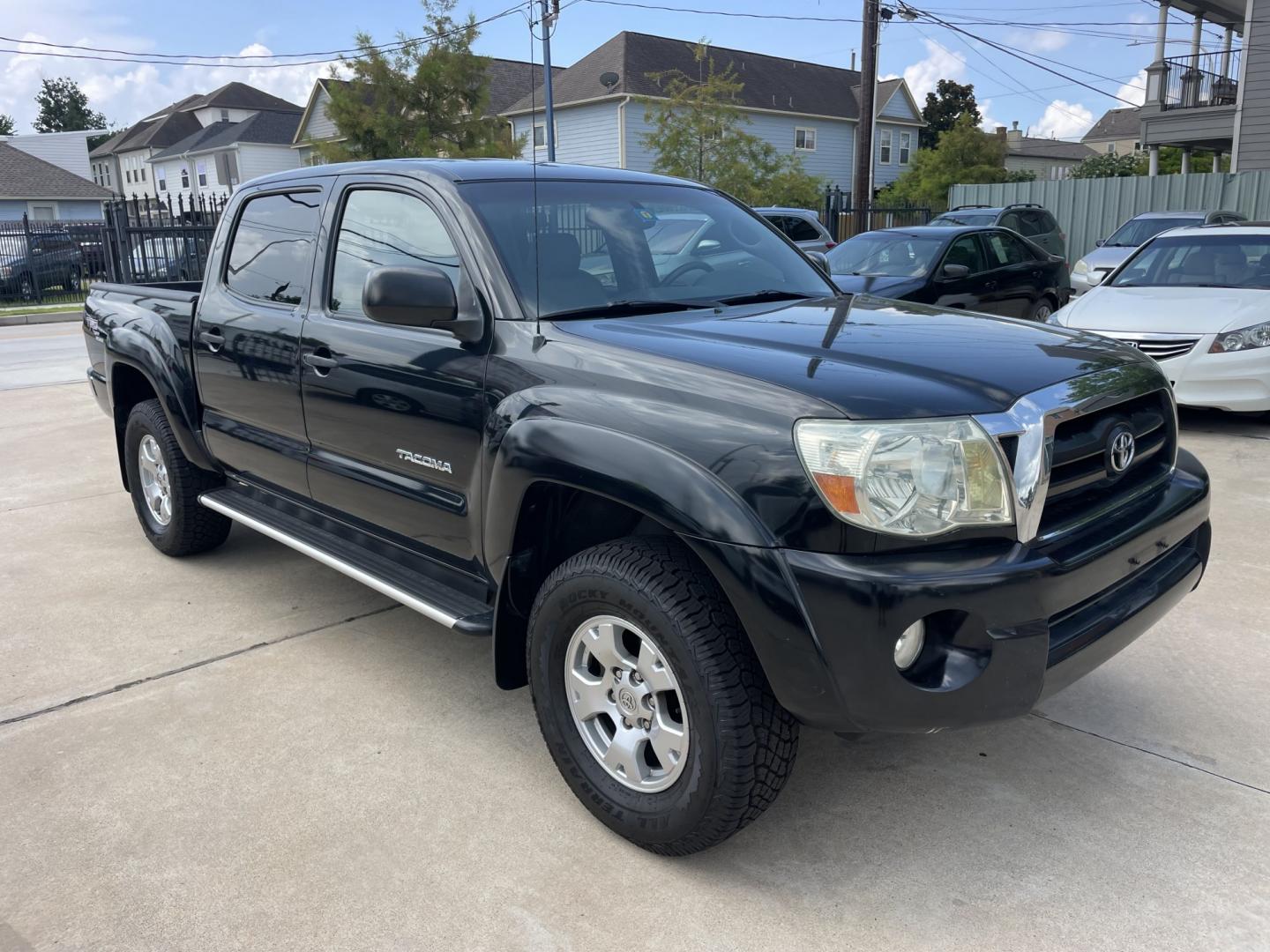 2006 Black /Silver Toyota Tacoma PreRunner Double Cab V6 Auto 2WD (5TEJU62N46Z) with an 4.0L V6 DOHC 24V engine, 5-Speed Automatic Overdrive transmission, located at 1501 West 15th St., Houston, 77008, (713) 869-2925, 29.797941, -95.411789- Photo#1