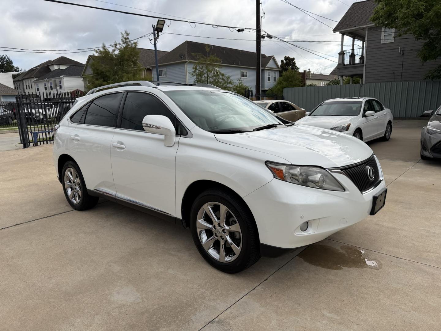 2012 White /Silver Lexus RX 350 FWD (JTJZK1BA5C2) with an 3.5L V6 DOHC 24V engine, 5-Speed Automatic transmission, located at 1501 West 15th St., Houston, 77008, (713) 869-2925, 29.797941, -95.411789- Photo#1