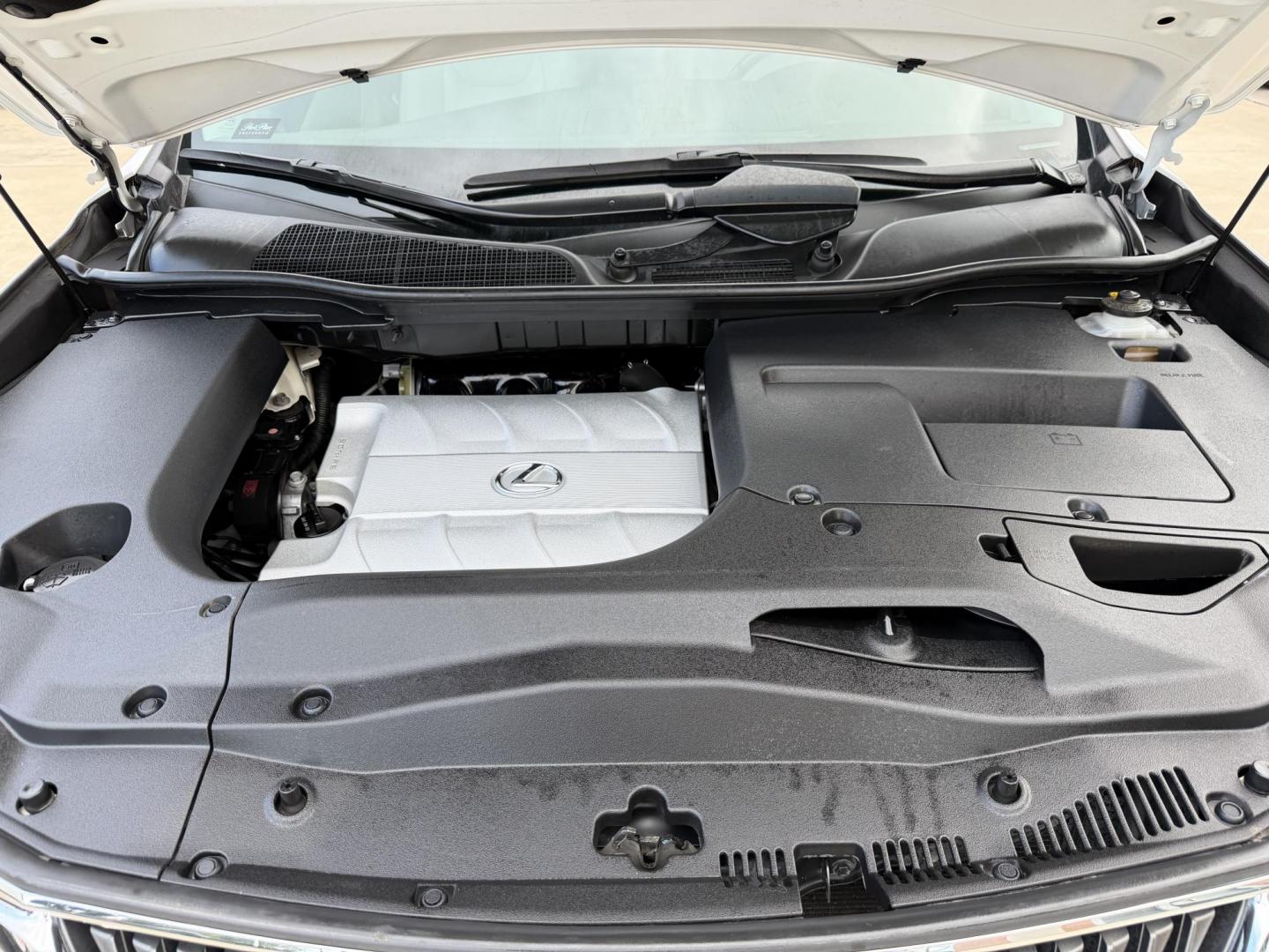 2012 White /Silver Lexus RX 350 FWD (JTJZK1BA5C2) with an 3.5L V6 DOHC 24V engine, 5-Speed Automatic transmission, located at 1501 West 15th St., Houston, 77008, (713) 869-2925, 29.797941, -95.411789- Photo#11