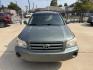 2004 Green /Silver Toyota Highlander V6 2WD with 3rd-Row Seat (JTEDP21A840) with an 3.3L V6 DOHC 24V engine, 5-Speed Automatic Overdrive transmission, located at 1501 West 15th St., Houston, 77008, (713) 869-2925, 29.797941, -95.411789 - Photo#2