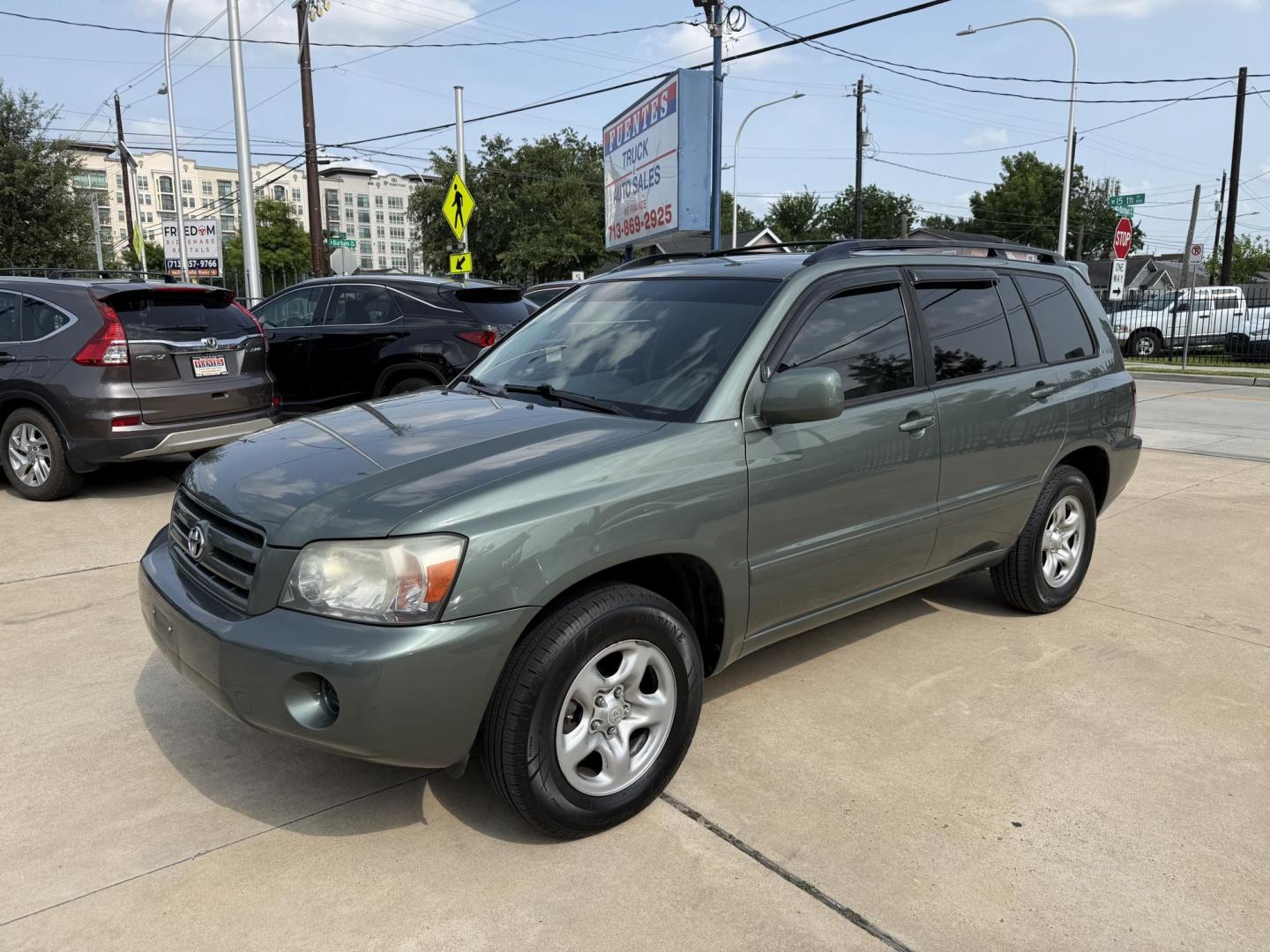 2004 Green /Silver Toyota Highlander V6 2WD with 3rd-Row Seat (JTEDP21A840) with an 3.3L V6 DOHC 24V engine, 5-Speed Automatic Overdrive transmission, located at 1501 West 15th St., Houston, 77008, (713) 869-2925, 29.797941, -95.411789 - Photo#0
