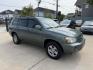 2004 Green /Silver Toyota Highlander V6 2WD with 3rd-Row Seat (JTEDP21A840) with an 3.3L V6 DOHC 24V engine, 5-Speed Automatic Overdrive transmission, located at 1501 West 15th St., Houston, 77008, (713) 869-2925, 29.797941, -95.411789 - Photo#1