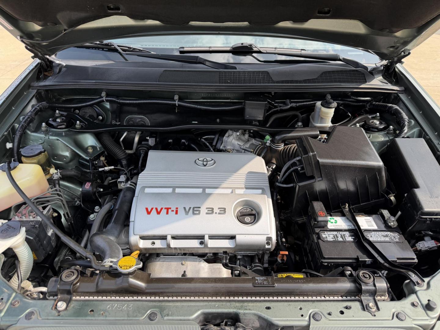 2004 Green /Silver Toyota Highlander V6 2WD with 3rd-Row Seat (JTEDP21A840) with an 3.3L V6 DOHC 24V engine, 5-Speed Automatic Overdrive transmission, located at 1501 West 15th St., Houston, 77008, (713) 869-2925, 29.797941, -95.411789 - Photo#14