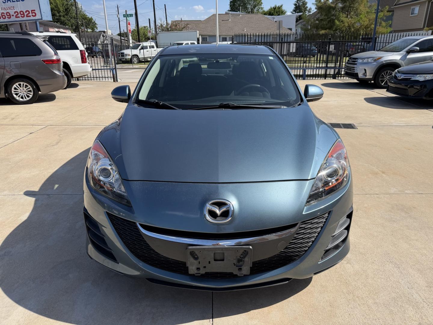 2010 Blue /Black Mazda MAZDA3 (JM1BL1SF6A1) with an 2.0 engine, Manual transmission, located at 1501 West 15th St., Houston, 77008, (713) 869-2925, 29.797941, -95.411789- Photo#1