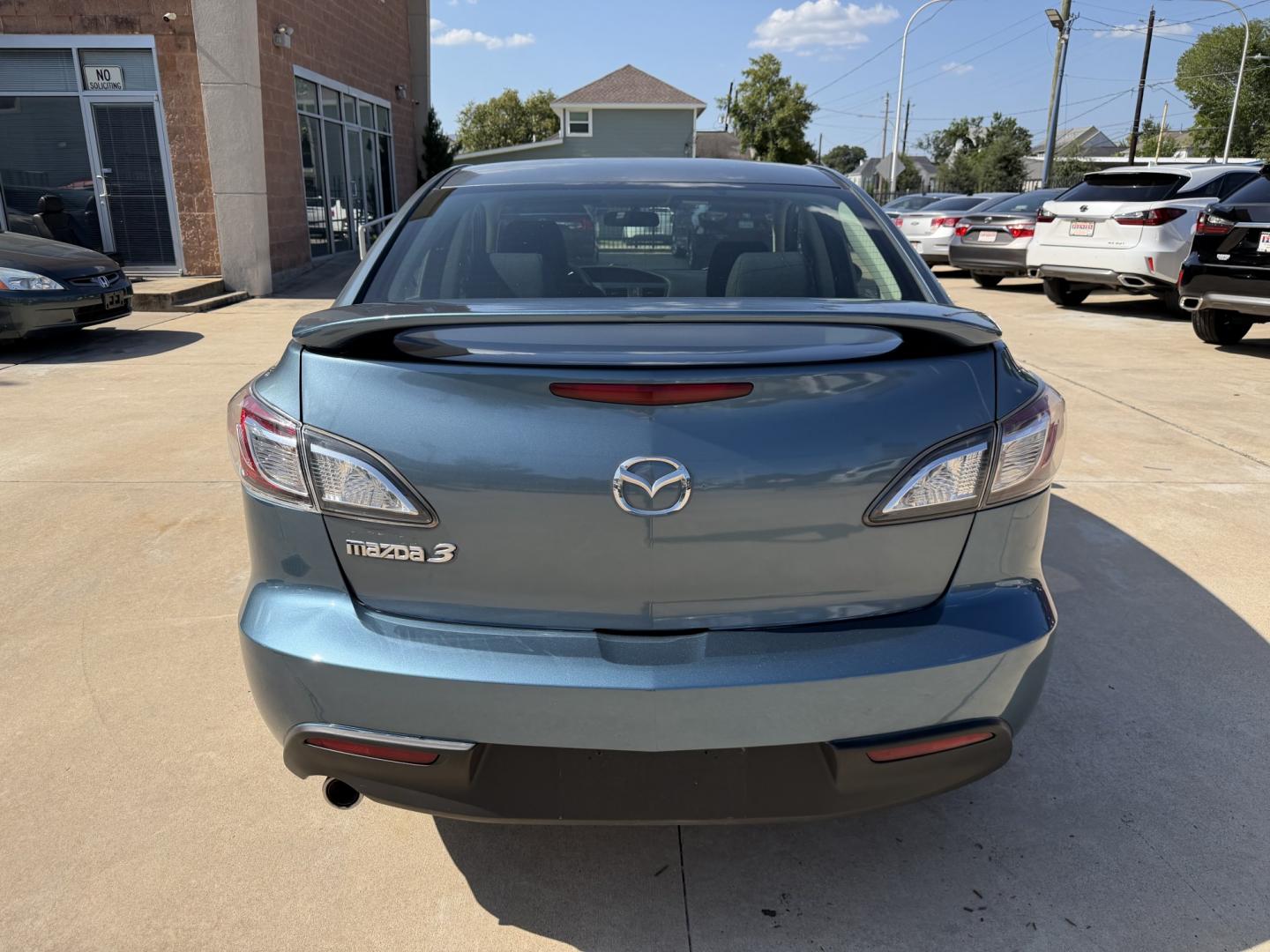 2010 Blue /Black Mazda MAZDA3 (JM1BL1SF6A1) with an 2.0 engine, Manual transmission, located at 1501 West 15th St., Houston, 77008, (713) 869-2925, 29.797941, -95.411789- Photo#4