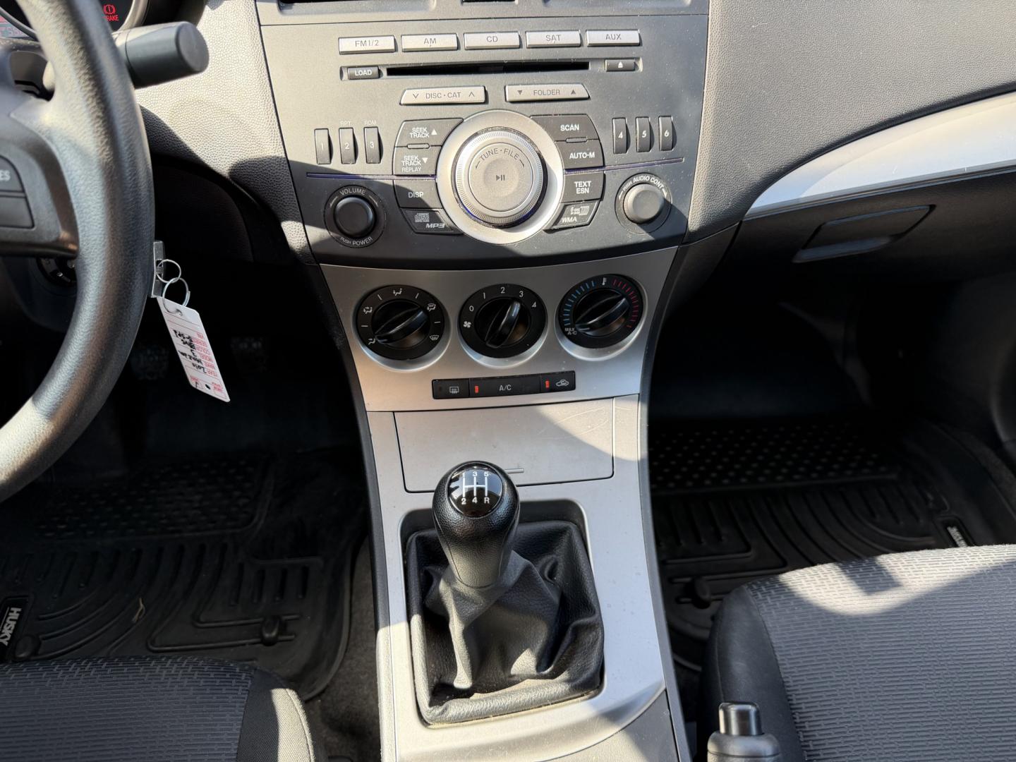 2010 Blue /Black Mazda MAZDA3 (JM1BL1SF6A1) with an 2.0 engine, Manual transmission, located at 1501 West 15th St., Houston, 77008, (713) 869-2925, 29.797941, -95.411789- Photo#11