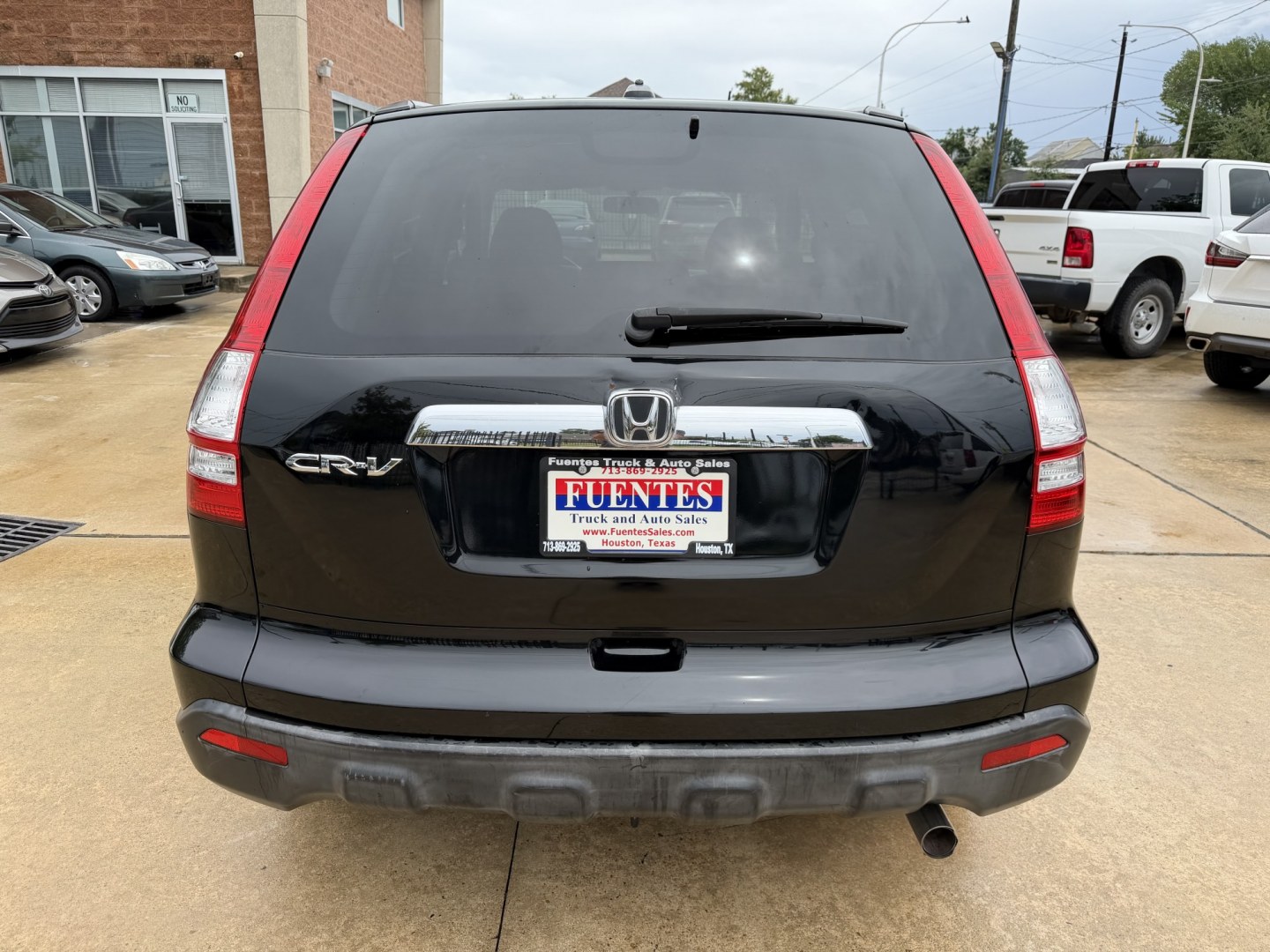 2007 Black /Black Honda CR-V EX-L 2WD AT (JHLRE387X7C) with an 2.4L L4 DOHC 16V engine, 5A OD transmission, located at 1501 West 15th St., Houston, 77008, (713) 869-2925, 29.797941, -95.411789- Photo#2