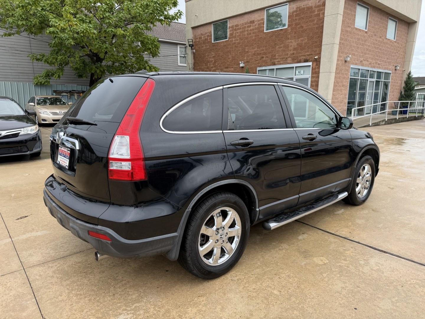 2007 Black /Black Honda CR-V EX-L 2WD AT (JHLRE387X7C) with an 2.4L L4 DOHC 16V engine, 5A OD transmission, located at 1501 West 15th St., Houston, 77008, (713) 869-2925, 29.797941, -95.411789- Photo#3
