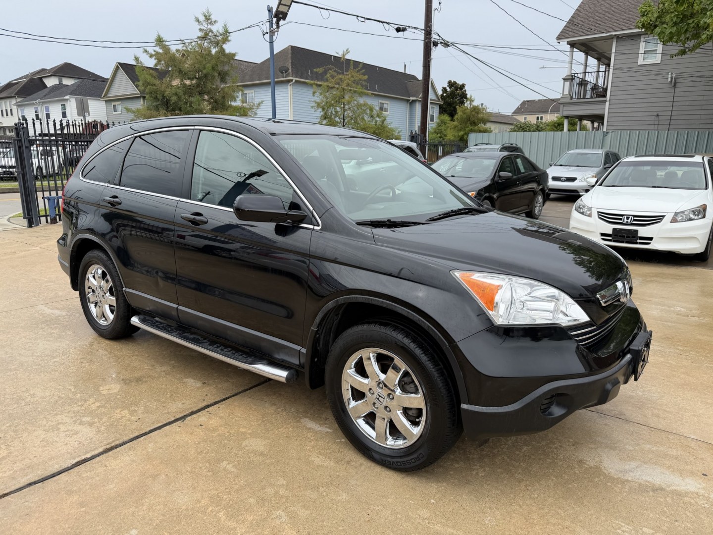 2007 Black /Black Honda CR-V EX-L 2WD AT (JHLRE387X7C) with an 2.4L L4 DOHC 16V engine, 5A OD transmission, located at 1501 West 15th St., Houston, 77008, (713) 869-2925, 29.797941, -95.411789- Photo#4