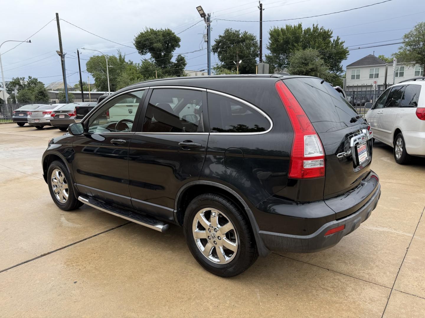 2007 Black /Black Honda CR-V EX-L 2WD AT (JHLRE387X7C) with an 2.4L L4 DOHC 16V engine, 5A OD transmission, located at 1501 West 15th St., Houston, 77008, (713) 869-2925, 29.797941, -95.411789- Photo#7