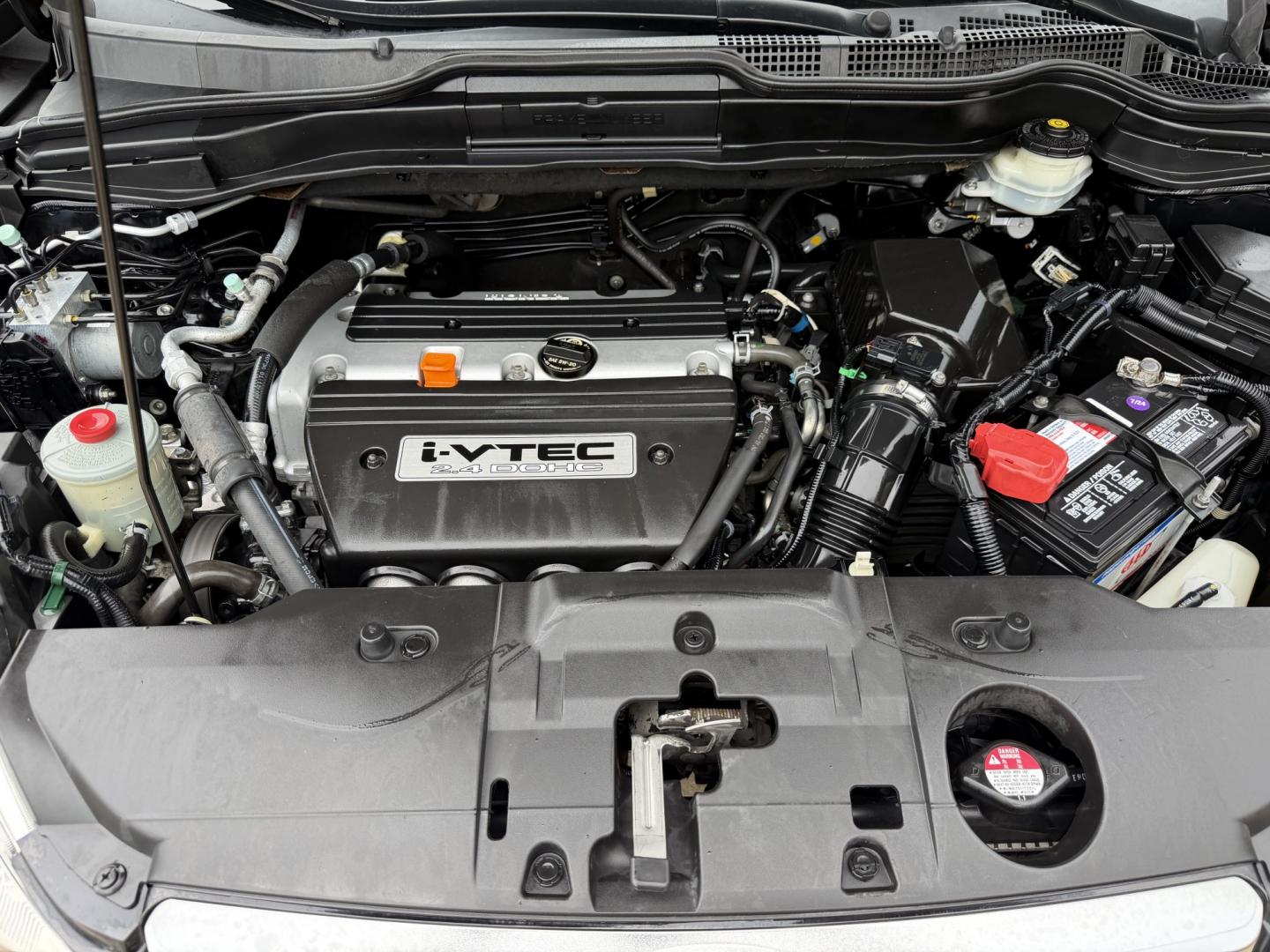 2007 Black /Black Honda CR-V EX-L 2WD AT (JHLRE387X7C) with an 2.4L L4 DOHC 16V engine, 5A OD transmission, located at 1501 West 15th St., Houston, 77008, (713) 869-2925, 29.797941, -95.411789- Photo#14