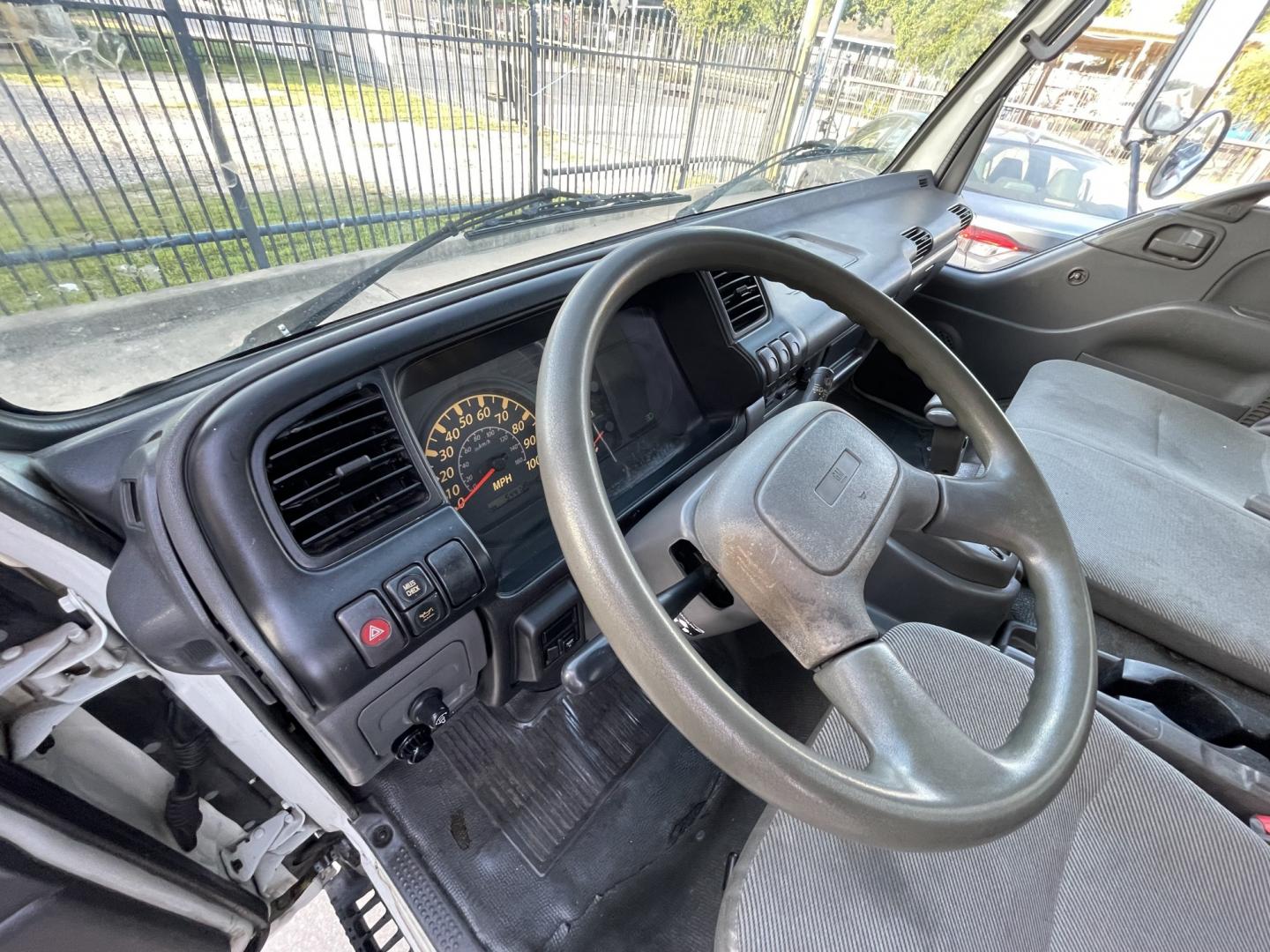 2005 White /Gray Chevrolet W45042 - (J8BC4B16X57) with an 5.2L L4 TURBO DIESEL engine, Automatic transmission, located at 1501 West 15th St., Houston, 77008, (713) 869-2925, 29.797941, -95.411789- Photo#9