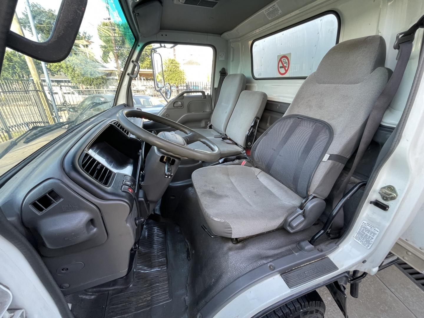 2005 White /Gray Chevrolet W45042 - (J8BC4B16X57) with an 5.2L L4 TURBO DIESEL engine, Automatic transmission, located at 1501 West 15th St., Houston, 77008, (713) 869-2925, 29.797941, -95.411789- Photo#12