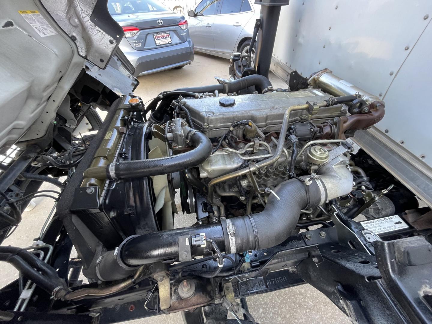 2005 White /Gray Chevrolet W45042 - (J8BC4B16X57) with an 5.2L L4 TURBO DIESEL engine, Automatic transmission, located at 1501 West 15th St., Houston, 77008, (713) 869-2925, 29.797941, -95.411789- Photo#19