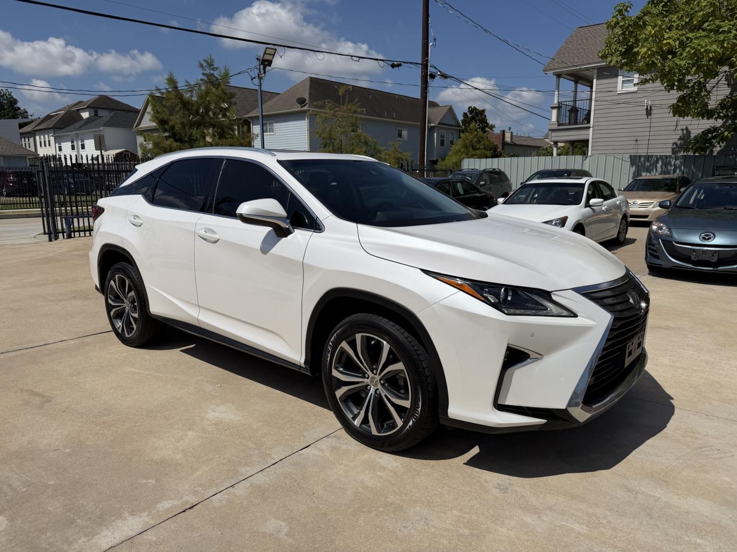 2017 White /Black Lexus RX 350 FWD (2T2ZZMCA1HC) with an 3.5L V6 DOHC 24V engine, 6A transmission, located at 1501 West 15th St., Houston, 77008, (713) 869-2925, 29.797941, -95.411789- Photo#2
